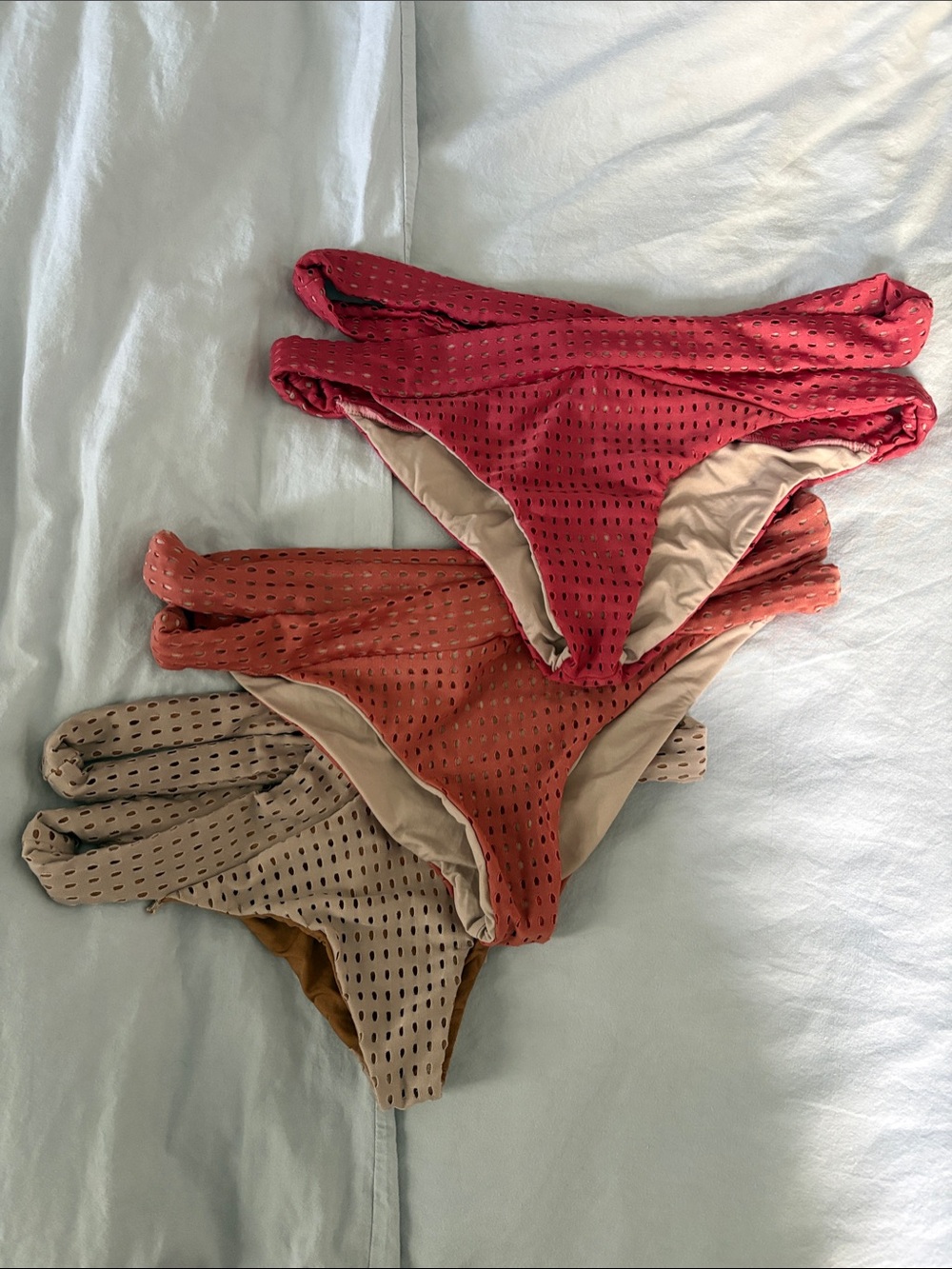 acacia swimwear Cutout Bikini Bottoms in Pink, Coral, and Tan